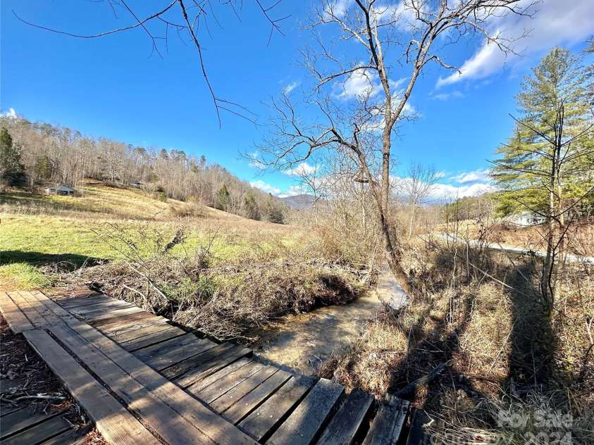 1256 Jakes Branch Road, Marion, NC 28752.  MLS# CAR4209847, YatesRealty ID 1445. Wooden bridge-driveway crossing, Jakes branch