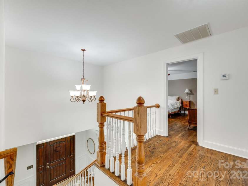 7122 Forest Ridge Road, Matthews, NC 28104.  MLS# CAR4249033, YatesRealty ID 14454. 2nd Floor Landing over lookign front door