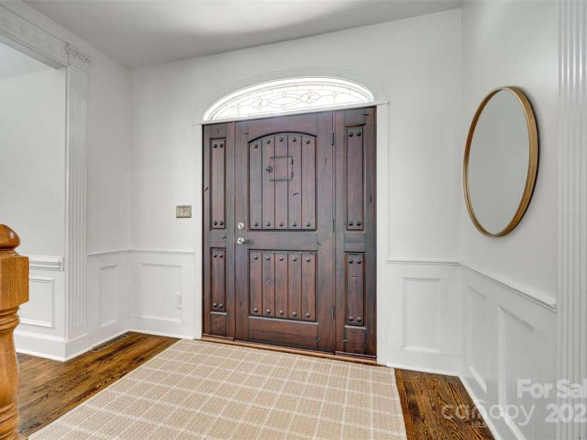 7122 Forest Ridge Road, Matthews, NC 28104.  MLS# CAR4249033, YatesRealty ID 14454. Beautiful Wood Front Door