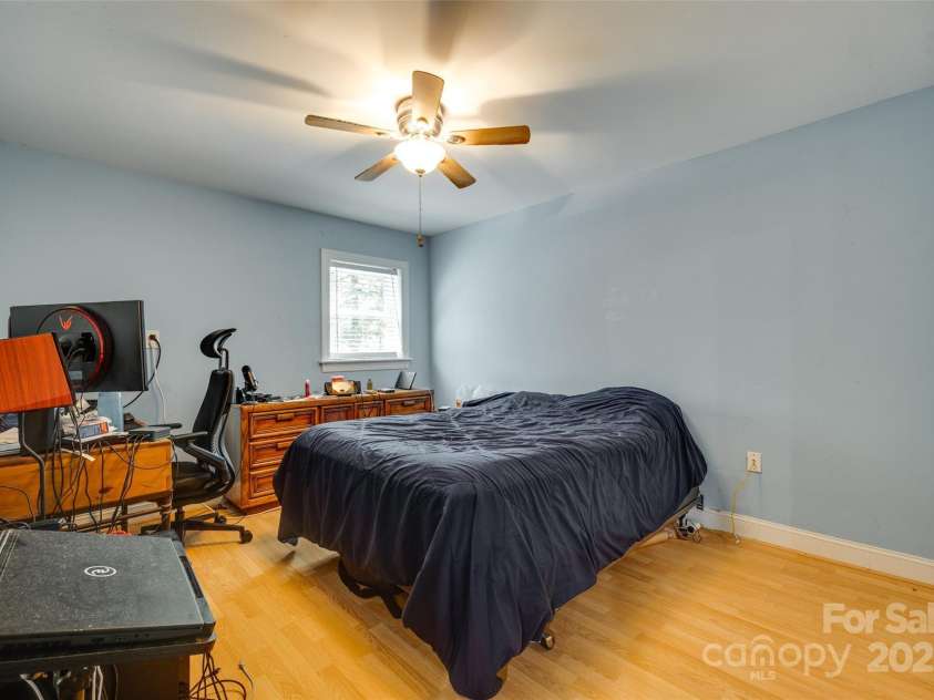 7122 Forest Ridge Road, Matthews, NC 28104.  MLS# CAR4249033, YatesRealty ID 14454. Bedroom in Basement