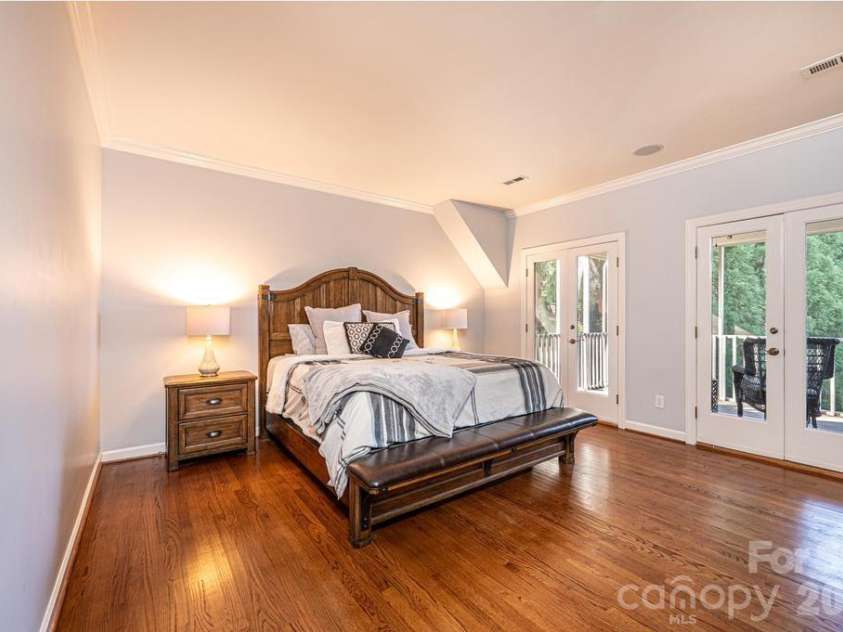 560 20th Avenue Court, Hickory, NC 28601.  MLS# CAR4323314, YatesRealty ID 14457. Primary suite double doors to a private deck