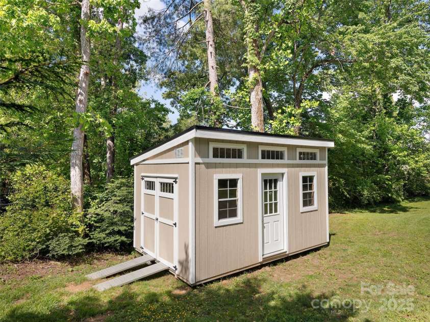 4 Greene Lane, Fletcher, NC 28732.  MLS# CAR4256056, YatesRealty ID 14458. Outbuilding in back