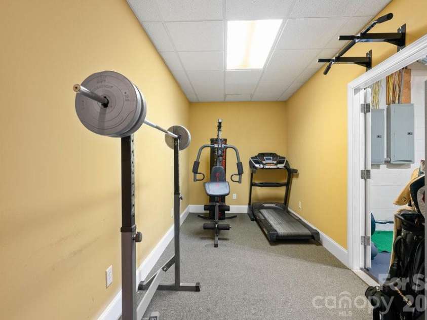 134 Brightmore Circle, Rutherfordton, NC 28139.  MLS# CAR4300991, YatesRealty ID 1446. Basement level workout room