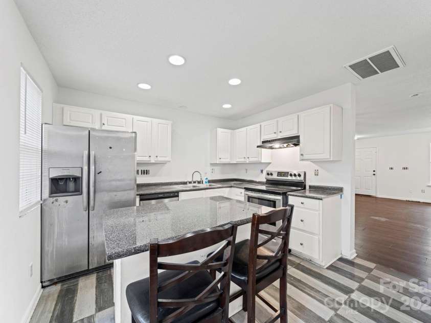 6766 Cypress Tree Lane, Charlotte, NC 28215.  MLS# CAR4330587, YatesRealty ID 1446. 