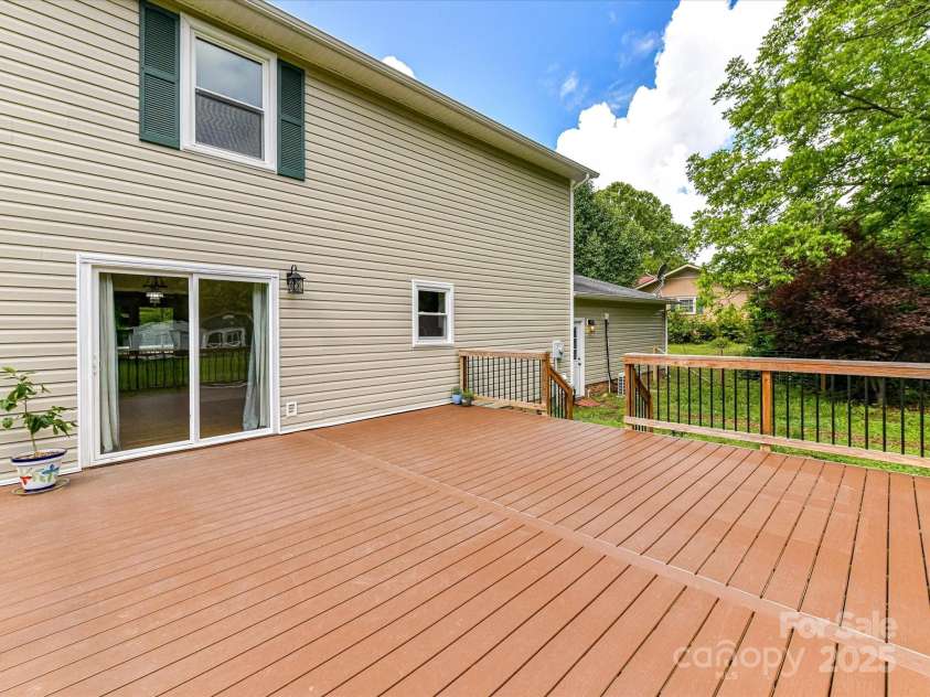 915 Gate Road, Monroe, NC 28112.  MLS# CAR4245908, YatesRealty ID 14460. Back deck + sliding doors to dining room