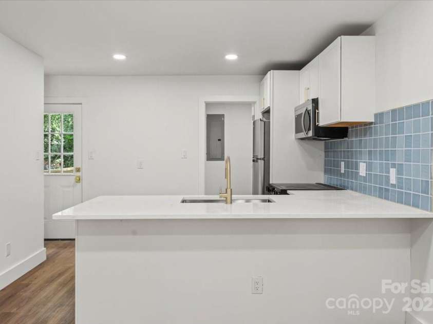 5444 Datha Avenue, Charlotte, NC 28269.  MLS# CAR4256726, YatesRealty ID 14474. 
