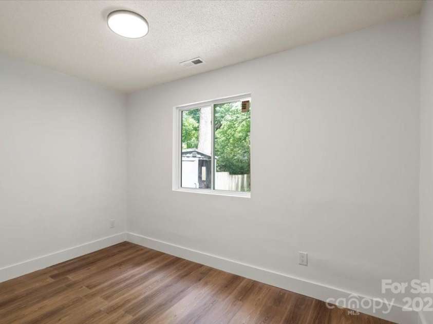 5444 Datha Avenue, Charlotte, NC 28269.  MLS# CAR4256726, YatesRealty ID 14474. 