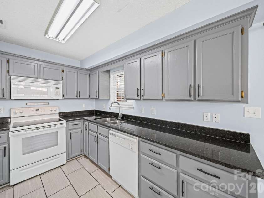 2003 Wilson Avenue, Monroe, NC 28110.  MLS# CAR4367970, YatesRealty ID 14477. 