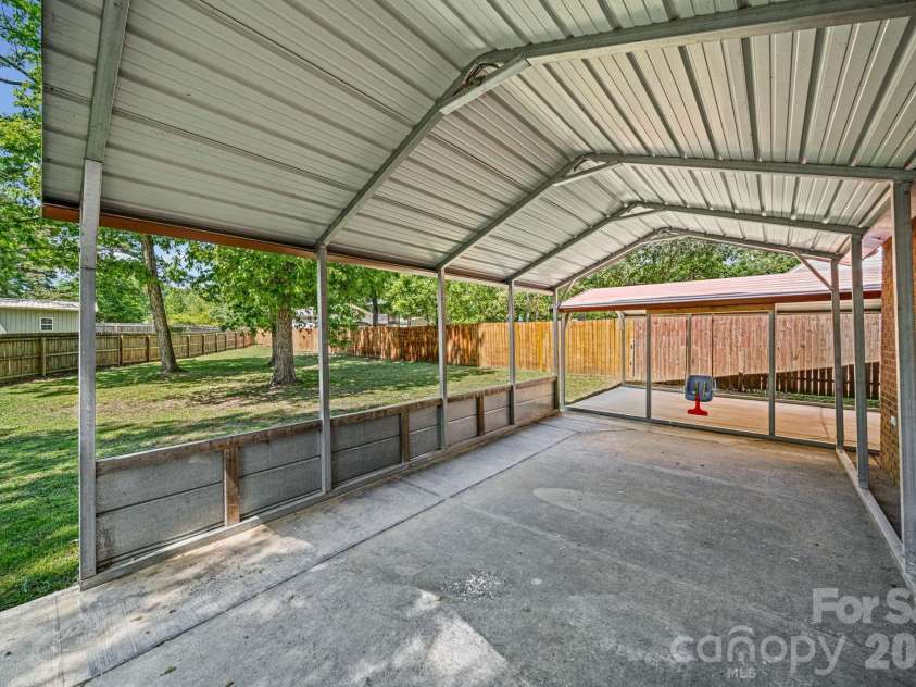 2003 Wilson Avenue, Monroe, NC 28110.  MLS# CAR4367970, YatesRealty ID 14477. 