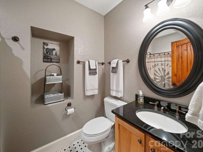 29 Bonnie Brae Drive, Weaverville, NC 28787.  MLS# CAR4352485, YatesRealty ID 14478. Downstairs full bath
