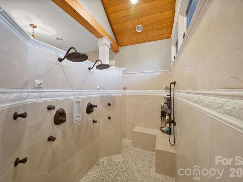 29 Bonnie Brae Drive, Weaverville, NC 28787.  MLS# CAR4352485, YatesRealty ID 14478. Walk-through shower with multiple sprayers