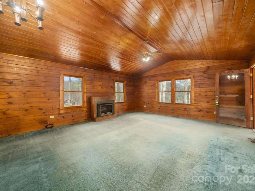 398 Locust Drive, Maggie Valley, NC 28751.  MLS# CAR4243493, YatesRealty ID 14479. Vaulted ceilings in great room