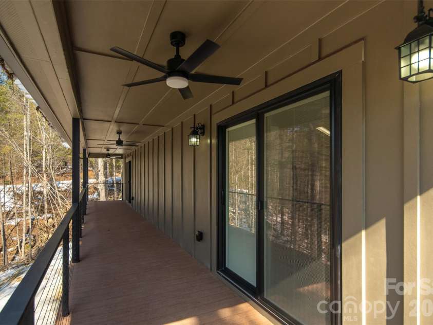 114 Woodpecker Road, Purlear, NC 28665.  MLS# CAR4346014, YatesRealty ID 14480. Covered Porch - Main Level