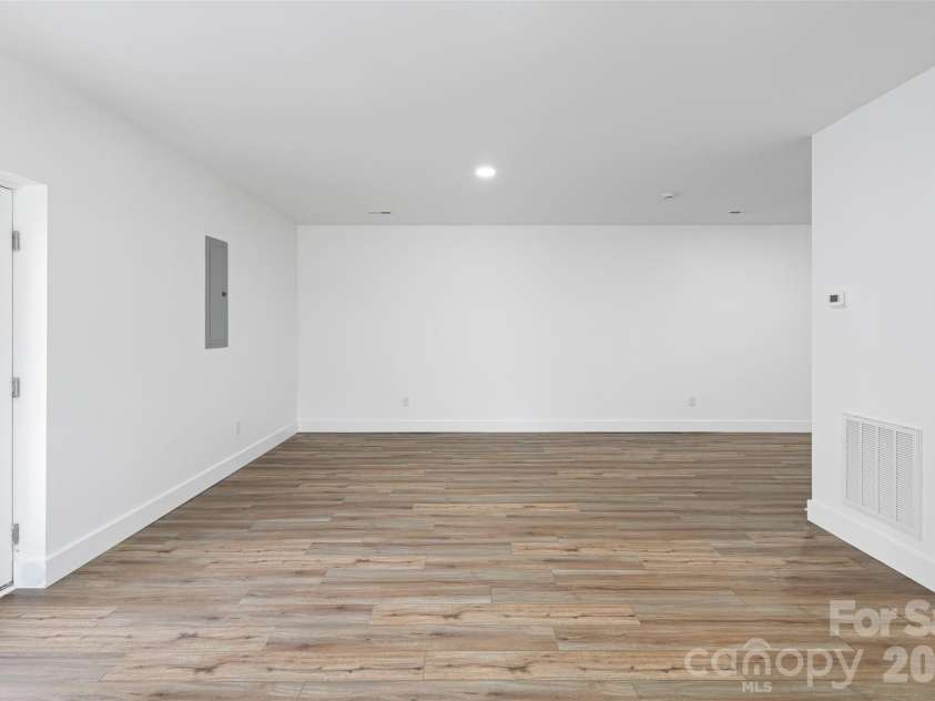 114 Woodpecker Road, Purlear, NC 28665.  MLS# CAR4346014, YatesRealty ID 14480. Third Bedroom Option - Lower Level