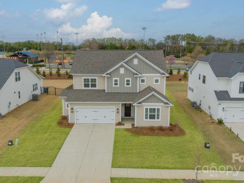 3918 Dahlia Drive, Harrisburg, NC 28075.  MLS# CAR4240653, YatesRealty ID 14484. Grass color has been enhanced