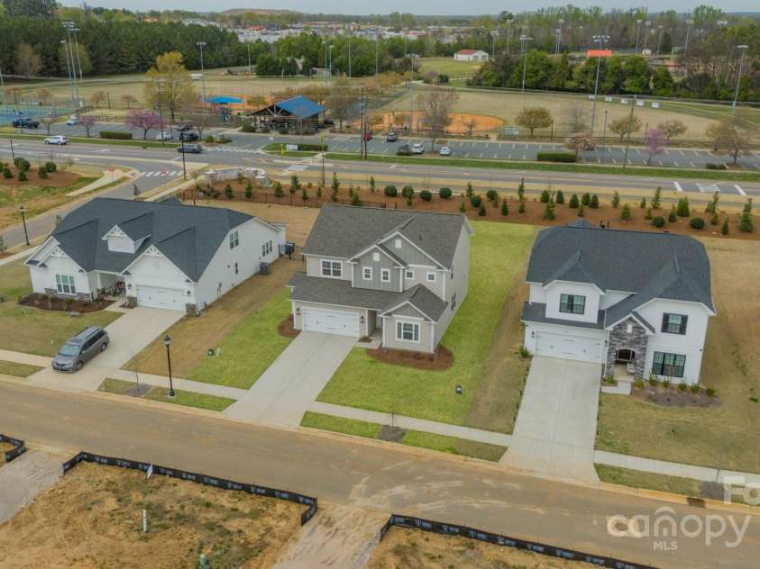 3918 Dahlia Drive, Harrisburg, NC 28075.  MLS# CAR4240653, YatesRealty ID 14484. Grass color has been enhanced