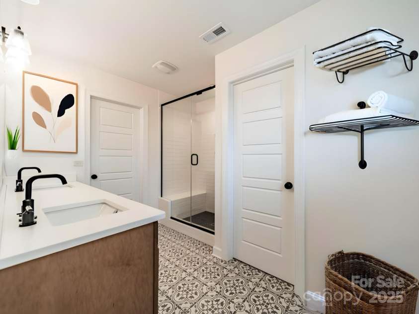 3918 Dahlia Drive, Harrisburg, NC 28075.  MLS# CAR4240653, YatesRealty ID 14484. Primary bath staged for representation