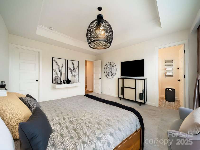 3918 Dahlia Drive, Harrisburg, NC 28075.  MLS# CAR4240653, YatesRealty ID 14484. Primary bedroom staged for representation