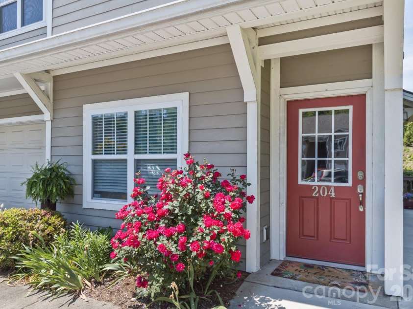 123 Foxden Drive, Fletcher, NC 28732.  MLS# CAR4382716, YatesRealty ID 14485. Once inside, steps lead up to the living area.