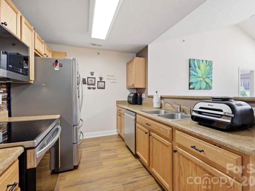 123 Foxden Drive, Fletcher, NC 28732.  MLS# CAR4404022, YatesRealty ID 14485. Galley Kitchen
