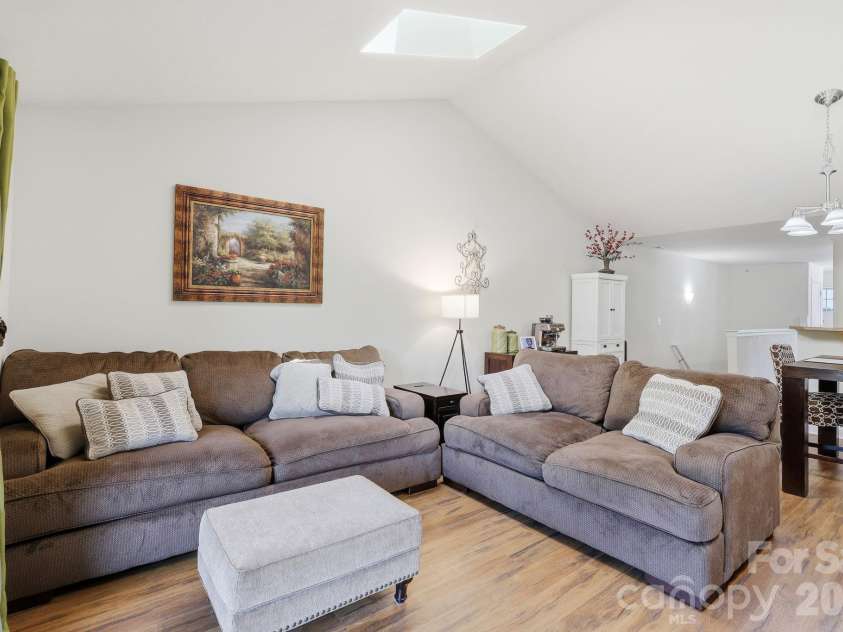 123 Foxden Drive, Fletcher, NC 28732.  MLS# CAR4404022, YatesRealty ID 14485. Open floor plan, vaulted ceilings with skylight create a very bright & open feel
