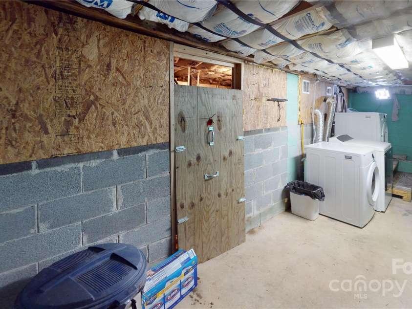 78 Smiling Fox Trail, Brevard, NC 28712.  MLS# CAR4176816, YatesRealty ID 1449. Main house basement