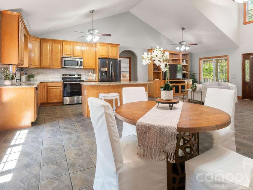 1235 Chatham Lane, Salisbury, NC 28146.  MLS# CAR4367157, YatesRealty ID 14490. Dining flows into kitchen. It's a grand open space.