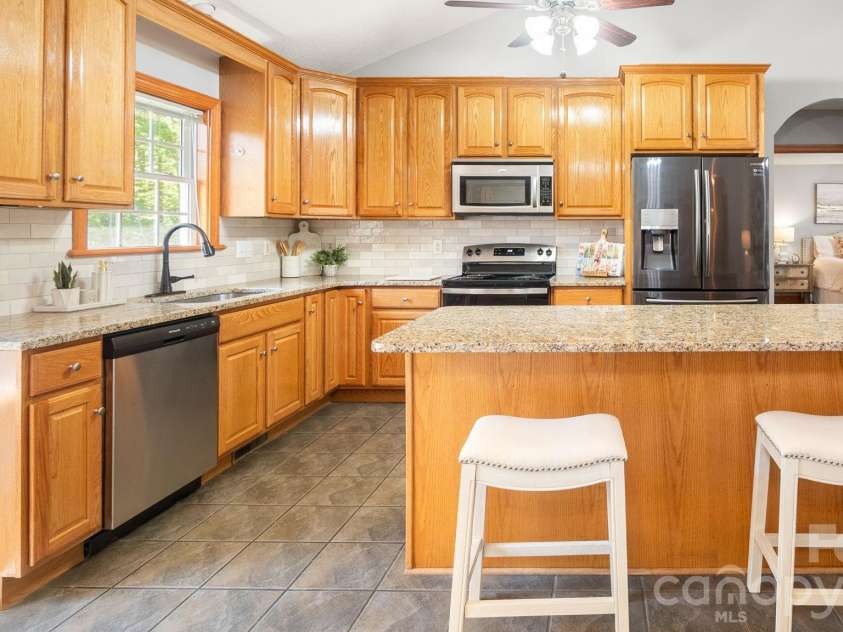1235 Chatham Lane, Salisbury, NC 28146.  MLS# CAR4367157, YatesRealty ID 14490. Large kitchen island with seating for entertaining