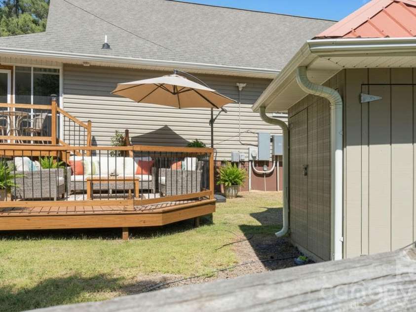 1235 Chatham Lane, Salisbury, NC 28146.  MLS# CAR4367157, YatesRealty ID 14490. *Virtually Staged Rendering* This is a sample idea of extension of the existing deck.