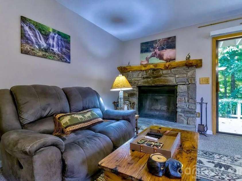 63 Riverside Villa Drive, Maggie Valley, NC 28751.  MLS# CAR4371414, YatesRealty ID 14491. 