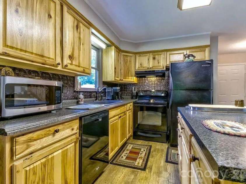 63 Riverside Villa Drive, Maggie Valley, NC 28751.  MLS# CAR4371414, YatesRealty ID 14491. 