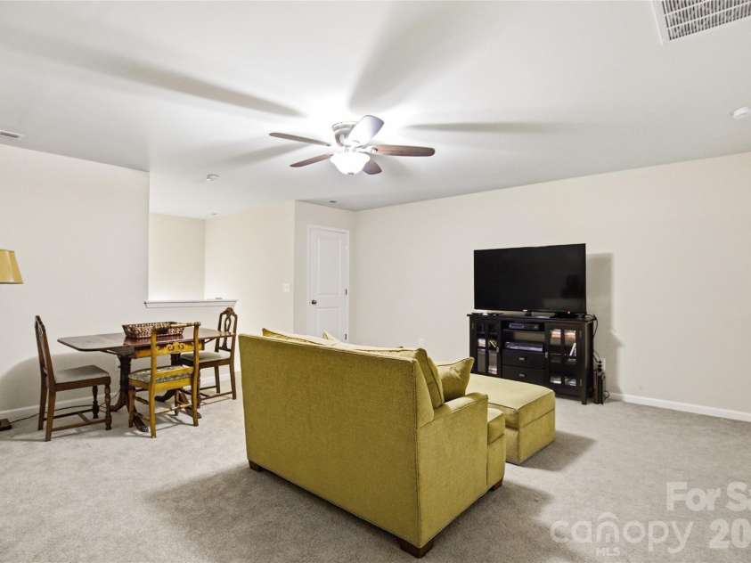 11824 Springpoint Lane, Charlotte, NC 28278.  MLS# CAR4360909, YatesRealty ID 14495. Upstair Loft and Game Room Living space