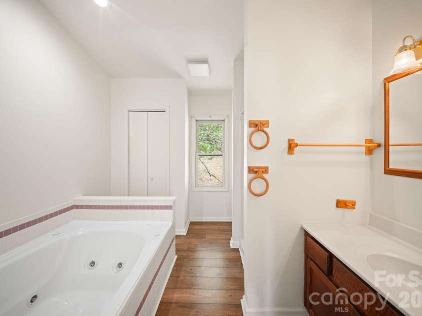 290 Hookers Gap Road, Candler, NC 28715.  MLS# CAR4373451, YatesRealty ID 14496. Second full bath in main home