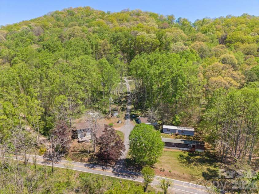 290 Hookers Gap Road, Candler, NC 28715.  MLS# CAR4376195, YatesRealty ID 14496. 8 units, self contained on a4.5 acre property, on a shared private drive