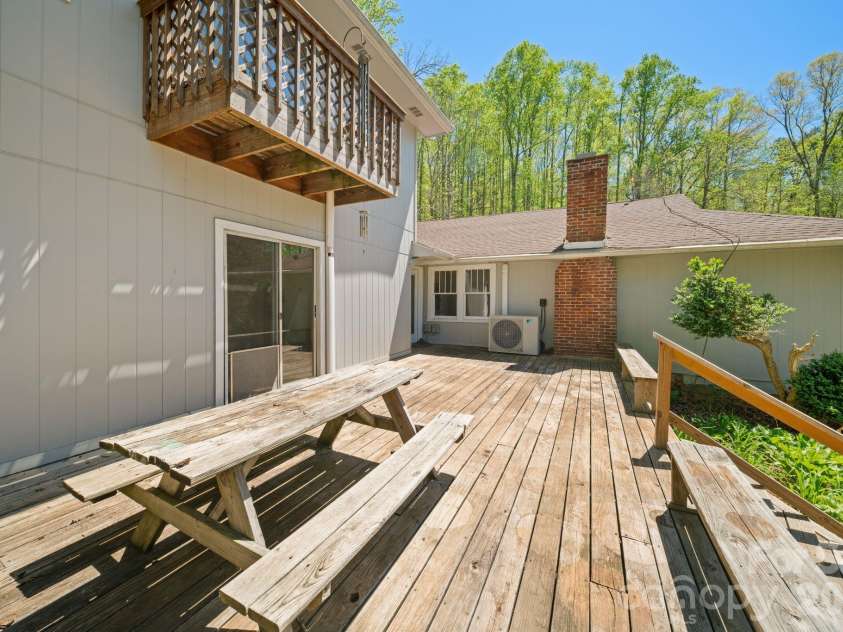 290 Hookers Gap Road, Candler, NC 28715.  MLS# CAR4376195, YatesRealty ID 14496. Great back deck with mountain views for entertaining