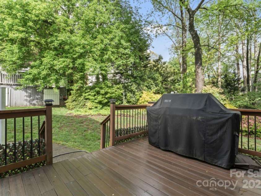 9009 Tayside Court, Huntersville, NC 28078.  MLS# CAR4247048, YatesRealty ID 14496. Deck off screened in porch