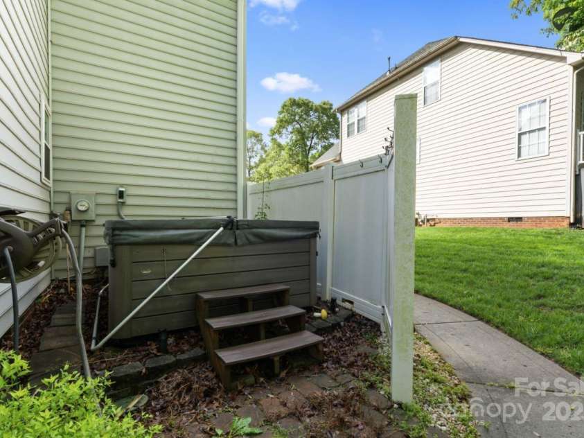 9009 Tayside Court, Huntersville, NC 28078.  MLS# CAR4247048, YatesRealty ID 14496. Hot tub