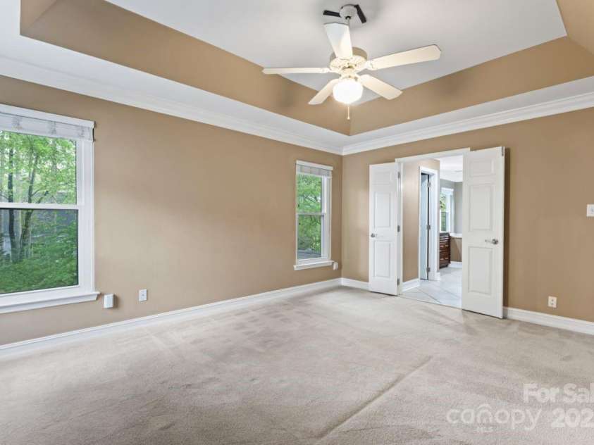 9009 Tayside Court, Huntersville, NC 28078.  MLS# CAR4247048, YatesRealty ID 14496. Primary bedroom