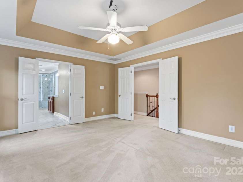 9009 Tayside Court, Huntersville, NC 28078.  MLS# CAR4247048, YatesRealty ID 14496. Primary bedroom