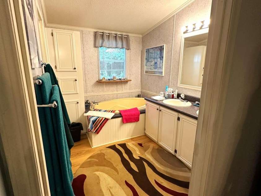 251 Rainbow Rapids Road, Rutherfordton, NC 28139.  MLS# CAR4161687, YatesRealty ID 145. Primary bath