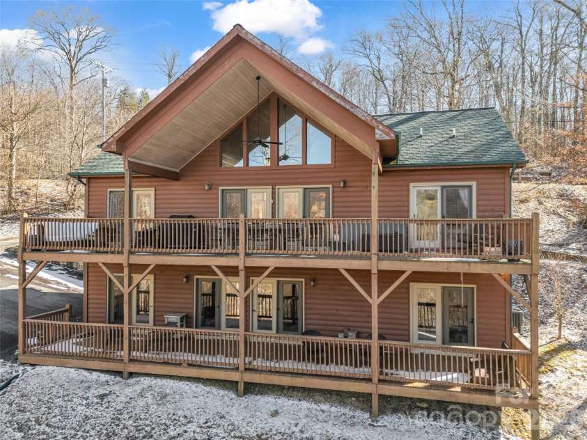 32 Zebulon Lane, Mars Hill, NC 28754.  MLS# CAR4336470, YatesRealty ID 1450. A birds eye view from the back showcases decks on both levels.