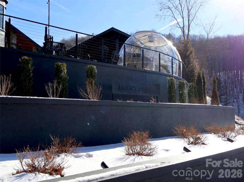 32 Zebulon Lane, Mars Hill, NC 28754.  MLS# CAR4336470, YatesRealty ID 1450. Hatley Pointe Mountain Resort is located within the Wolf Laurel Community. It has been recently renovated and features a restaurant: Smoke & Timber.