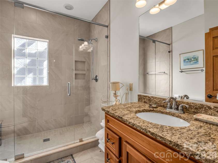 32 Zebulon Lane, Mars Hill, NC 28754.  MLS# CAR4336470, YatesRealty ID 1450. Just accross from the second bedroom, a full bathroom offers added convenience.