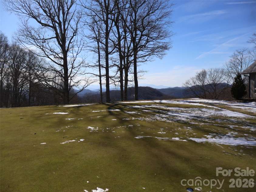32 Zebulon Lane, Mars Hill, NC 28754.  MLS# CAR4336470, YatesRealty ID 1450. The putting green has the most stunning view!