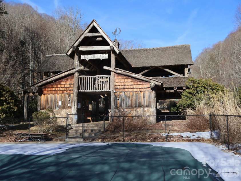 32 Zebulon Lane, Mars Hill, NC 28754.  MLS# CAR4336470, YatesRealty ID 1450. The Village Club features a beautiful open-air pavillion overlooking the outdoor pool.