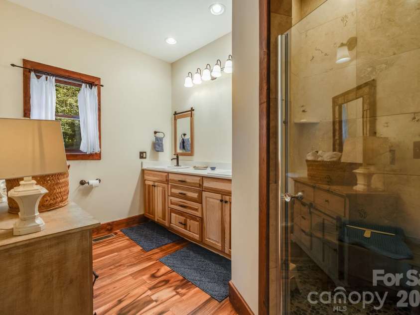 32 Zebulon Lane, Mars Hill, NC 28754.  MLS# CAR4417951, YatesRealty ID 1450. En-suite Bathroom primary