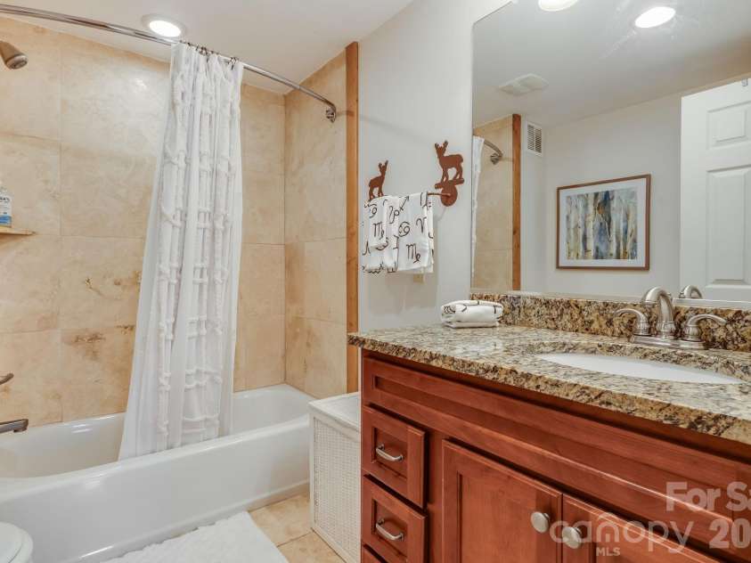 32 Zebulon Lane, Mars Hill, NC 28754.  MLS# CAR4417951, YatesRealty ID 1450. Lower level Bathroom