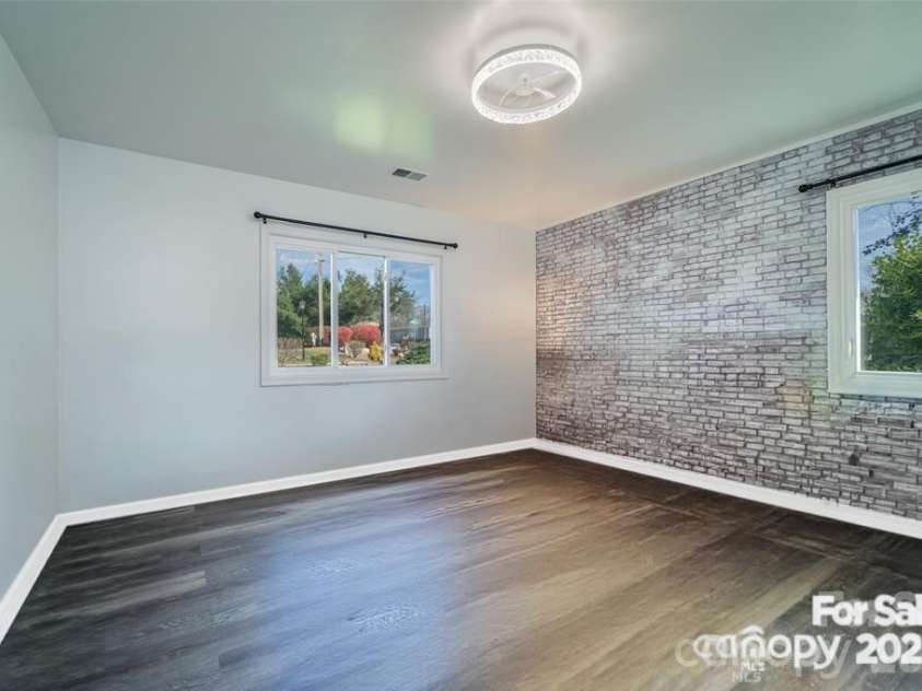 1 Wintry Drive, Hendersonville, NC 28792.  MLS# CAR4319352, YatesRealty ID 14502. Bedroom furniture virtually removed