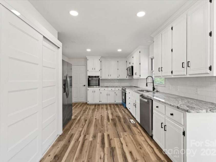 221 Pennington Road, Rock Hill, SC 29732.  MLS# CAR4330829, YatesRealty ID 14504. Kitchen/Laundry Room