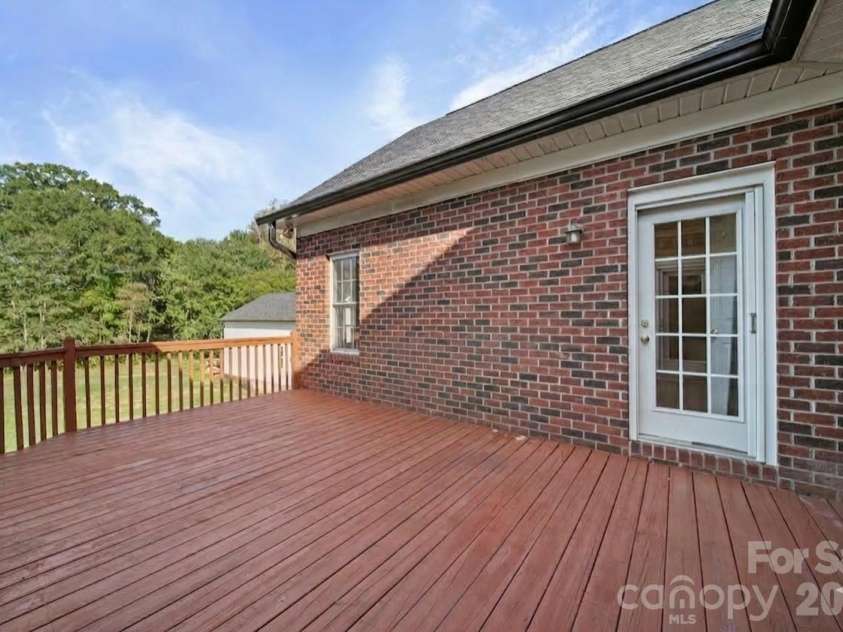 5106 Pond Bluff Drive, Monroe, NC 28112.  MLS# CAR4358314, YatesRealty ID 14505. Back Deck with access to primary suite